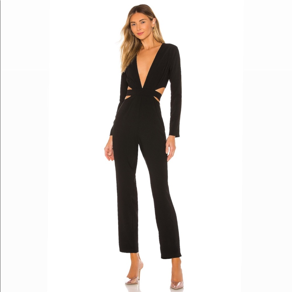Amazing black jumpsuit with cut outs! Never worn.
